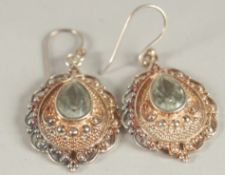 A PAIR OF SILVER AND AQUAMARINE EARRINGS.