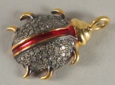 A DIAMOND BEETLE CHARM.