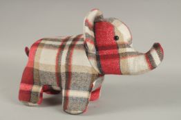 A WOOLLEN DOORSTOP, ELEPHANT.