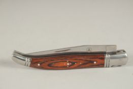 A FOLDING KNIFE KNIFE.