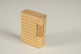 A DUPONT GILT METAL CIGARETTE LIGHTER, with hatched decoration to the body, with original box.