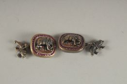 A GOOD PAIR OF RUSSIAN SILVER AND RUBY ELEPHANT CUFFLINKS. Head 88 A. H. Faberge.