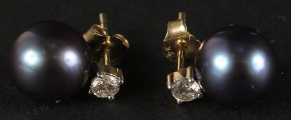 A PAIR OF 9CT YELLOW GOLD BLUE/PURPLE PEARL STUDS set with 0.26ct diamonds, boxed.