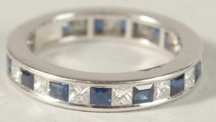 AN 18CT WHITE GOLD, SAPPHIRE AND DIAMOND FULL ETERNITY RING.