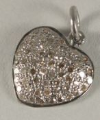 A DIAMOND HEART CHARM.