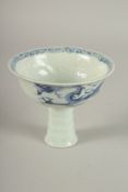 A CHINESE BLUE AND WHITE STEM CUP. 4.75cms diameter.