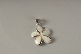A SILVER AND OPAL PENDANT.