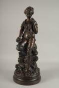 GUSTAVE REY (19TH CENTURY) FRENCH A BRONZE OF A YOUNG LADY holding a shell and dressed in her