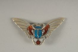 A SILVER AND ENAMEL SCARAB BROOCH.