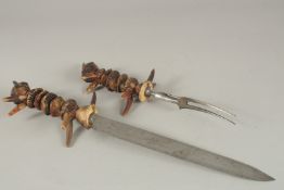 A RARE SHEFFIELD CUTLER ANTLER HANDLED CARVING SET, the blade signed SHEAR STEEL. Note: an example