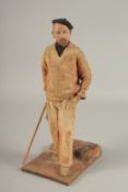 AN UNUSUAL MAQUETTE OF A STANDING FRENCHMAN by J. LE BROEC, made from fibre, wood and painted. 32cms