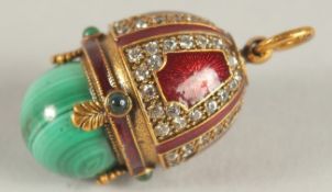 A SILVER, BLUE ENAMEL AND MALACHITE EGG PENDANT.