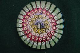 A GOOD BACCARAT MILLEFIORI GLASS PAPERWEIGHT, dated 1848.