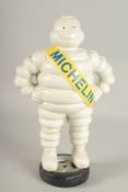 A LARGE CAST IRON MICHELIN MAN. 15ins high.