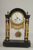 A GOOD EARLY 19TH CENTURY BLACK MARBLE AND ORMOLU CLOCK with circular enamel dial, signed Frenier