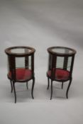 A GOOD PAIR OF VICTORIAN INLAID MAHOGANY CIRCULAR BIJOUTERIE DISPLAY CABINETS with glass top and