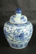 A CHINESE BLUE AND WHITE GINGER JAR AND COVER. 30cms high.