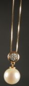 A 9CT YELLOW GOLD CULTURED PEARL AND DIAMOND BALE PENDANT with 9ct yellow gold box link chain,