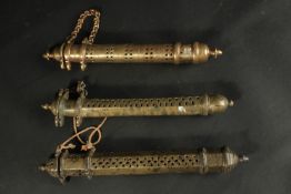 THREE 19TH CENTURY ISLAMIC BRASS OPENWORK SCROLL CONTAINERS, (3).