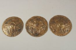 A COLLECTION OF THREE 18TH-19TH CENTURY OTTOMAN ARMENIAN GILT COPPER CIRCULAR PLAQUES, depicting