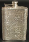 A 19TH CENTURY INDIAN ENGRAVED SILVER FLASK, with fine floral designs, 13.5cm high.