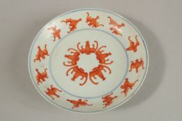 A CHINESE BLUE AND WHITE WITH IRON RED PORCELAIN BAT DISH, with character mark to base, 15.5cm