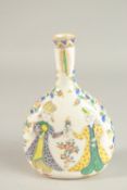 A TURKISH KUTAHYA GLAZED POTTERY BOTTLE, painted with figures, 22cm high.