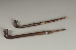 TWO FINE OTTOMAN TURKISH SILVER AND BRASS INLAID WOODEN SMOKING PIPES, longest 43cm long, (2).