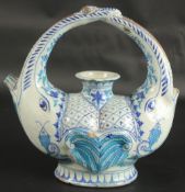 AN UNUSUAL 19TH CENTURY INDIAN MULTAN ZOOMORPHIC GLAZED POTTERY EWER, 27cm high.