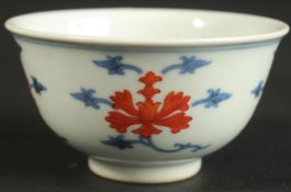 A SMALL CHINESE BLUE AND WHITE PORCELAIN CUP, with character mark to base, 8cm diameter.