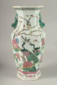 A CHINESE FAMILLE ROSE PORCELAIN HEXAGONAL TWIN HANDLE VASE, 38.5cm high.