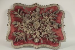 A FINE 19TH CENTURY OTTOMAN TURKISH SILVER FILIGREE MIRROR, of lobed cartouche form with silver