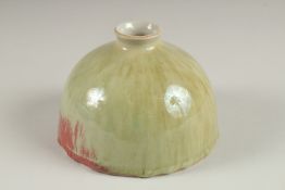 A CHINESE GREEN GLAZED PORCELAIN DOMED INK POT, 13.5cm diameter.