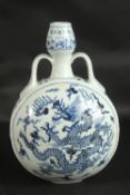 A CHINESE BLUE AND WHITE PORCELAIN TWIN HANDLE DRAGON MOON FLASK, 32.5cm high.