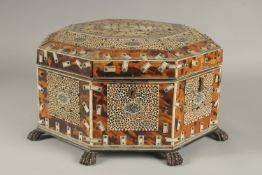 A 19TH CENTURY ANGLO INDIAN TORTOISESHELL, BONE AND PENWORK OCTAGONAL SEWING BOX, 33cm at widest