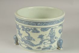 A CHINESE BLUE AND WHITE PORCELAIN JARDINIERE, decorated with figures, 18.5cm diameter.