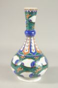 A TURKISH IZNIK GLAZED POTTERY VASE, 33cm high.