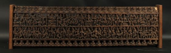 A FINE LARGE 19TH CENTURY SOUTH INDIAN CARVED WOODEN PANEL, carved with rows of dancers. 97.5cm x