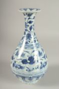 A CHINESE BLUE AND WHITE PORCELAIN VASES, painted with ducks and lotus, 27cm high.