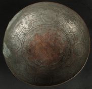 A FINE18TH-19TH CENTURY PERSIAN QAJAR TINNED COPPER CALLIGRAPHIC MAGIC BOWL, 18.5cm wide.