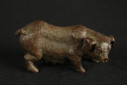 A BRONZE OKIMONO OF A PIG.