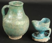 A 12TH CENTURY PERSIAN KASHAN TURQUOISE GLAZED POTTERY JUG AND OIL LAMP, provenance: formerly