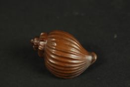 A BRONZE OKIMONO OF A SEA SNAIL.