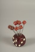 A RARE EARLY 20TH CENTURY ART DECO BAKELITE CHERRY AMBER TYPE DICE SHAPED COCKTAIL FOLKS.