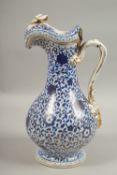 A 19TH CENTURY PERSIAN MARKET RUSSIAN GARDNER PORCELAIN LIDDED JUG, with blue and white gilded