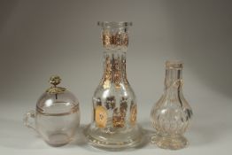 TWO 19TH CENTURY OTTOMAN MARKET GILDED GLASS HUQQA BASES, and another 19th century Ottoman Turkish