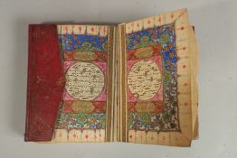 A 19TH CENTURY OTTOMAN LEATHER BOUND QURAN, for Hafez Othman Alkamily study of Ahmed Najati, dated