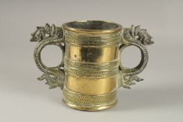 AN UNUSAL GILT BRONZE TWIN HANDLE VESSEL, with strainer at the base, 15.5cm high.