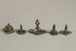A GROUP OF FIVE 17TH CENTURY TIBETAN OR SOUTH INDIAN BUDDHIST BRONZE STAMPS, (5).