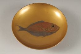 A FINE JAPANESE GILT LACQUER DISH, central fish design with very finely painted scales, signed to